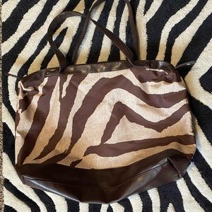 Brown zebra weekender bag and makeup bag combo